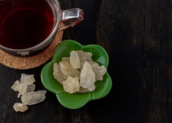 crystal rock sugar on wood background