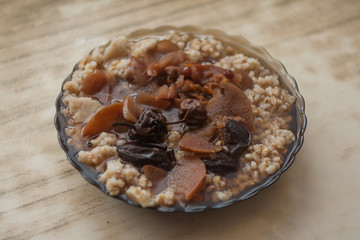 Pearl barley festive porridge with dried fruits, kutia with uzvar. Ukrainian national dish