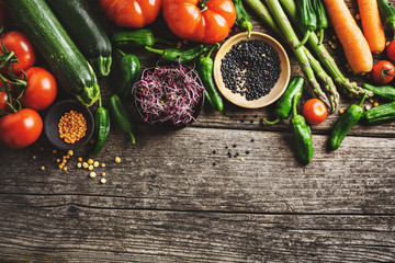 Different vegetables on wooden background
