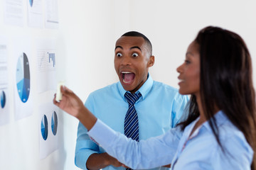 Obraz premium Businessman with idea at brainstorming meeting