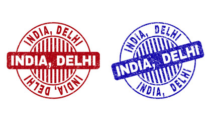 Grunge INDIA, DELHI round stamp seals isolated on a white background. Round seals with grunge texture in red and blue colors. Vector rubber imprint of INDIA, DELHI tag inside circle form with stripes.