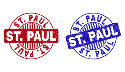 Grunge ST. PAUL round stamp seals isolated on a white background. Round seals with grunge texture in red and blue colors. Vector rubber watermark of ST. PAUL label inside circle form with stripes.