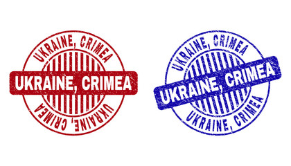 Grunge UKRAINE, CRIMEA round stamp seals isolated on a white background. Round seals with grunge texture in red and blue colors. Vector rubber watermark of UKRAINE,