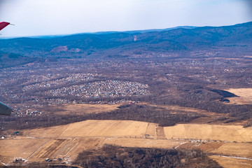 View from the plane on the outskirts of the city of Artem. Primorsky Krai.