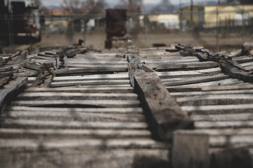 Old wooden shipping crates in an industrial yard