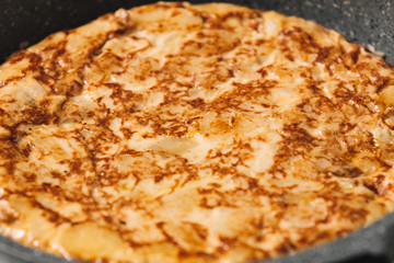 tortilla de patatas , typical spanish dish