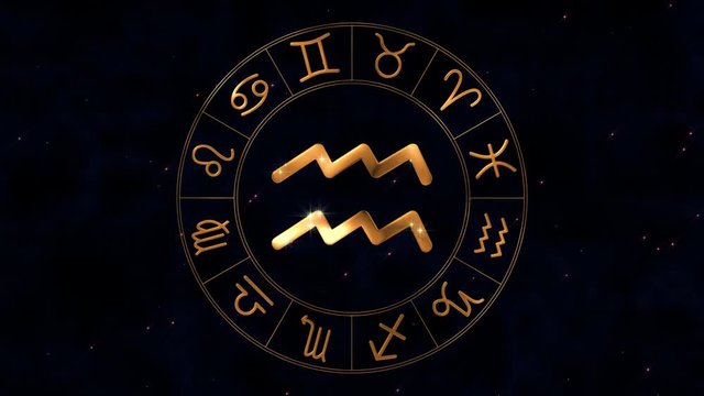 Golden zodiac horoscope spinnig wheel with Aquarius (Water-Bearer) sign