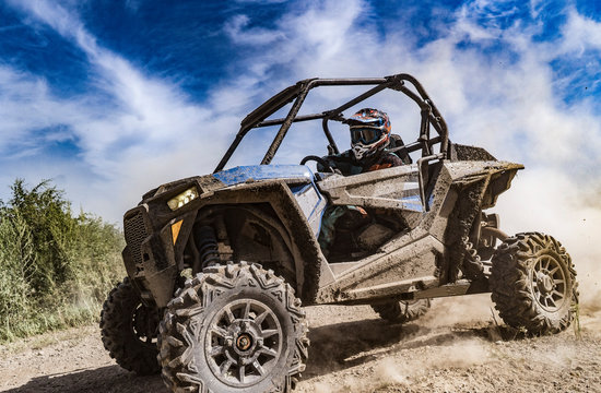 ATV adventure. Buggy extreme ride on dirt track. UTV