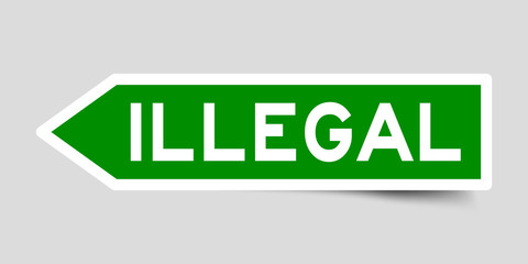Arrow shape green color sticker in word illegal on gray background