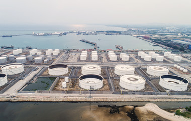 Aerial view or top view night light oil terminal is industrial facility for storage of oil and...
