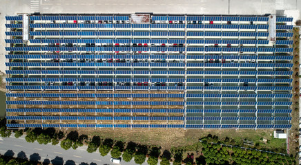 Solar photovoltaic panel for aerial open-air car parking lot