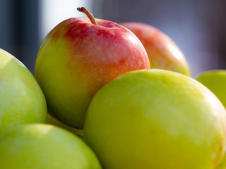 Lots of fresh green red apples.