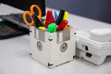 recycle floppy disk, Creative objects used for Store supplies such as pen pencils Scissors in a box...