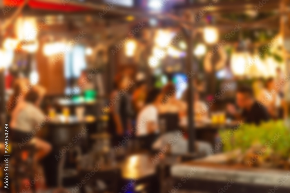 Poster abstract blur image of night festival in a restaurant and the atmosphere is happy and relaxing with 