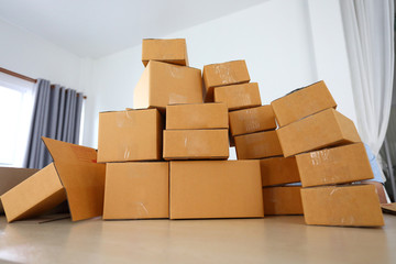 brown box post package many size preparing express delivery for consumer order in home office of freelance work online
