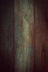 Obraz premium dark wood wall background with shadow vignette border