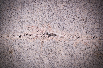gray marble background with spots and lines. vignette, texture, geological