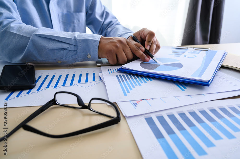 Poster business documents on office graph financial with social network diagram discussing data analysis da