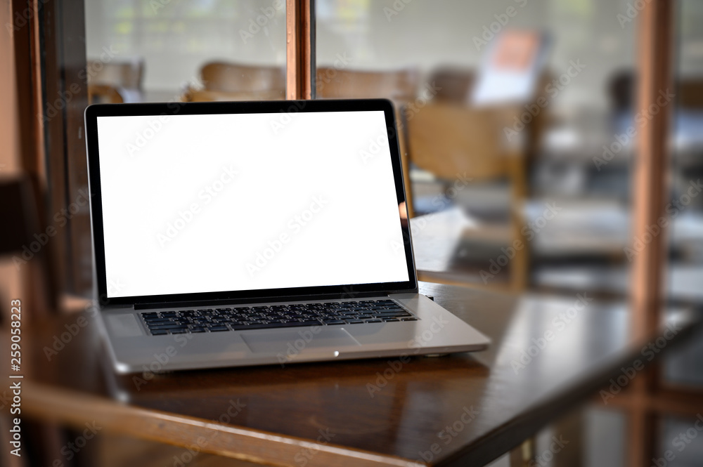 Poster mockup image of business laptop with blank screen on table blank copy space screen for your advertis
