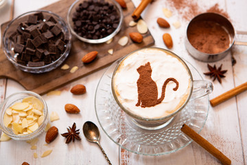 cat mark decorated on cup of hot chocolate
