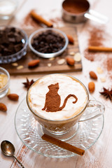 cat mark decorated on cup of hot chocolate