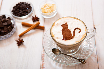 cat mark decorated on cup of hot chocolate
