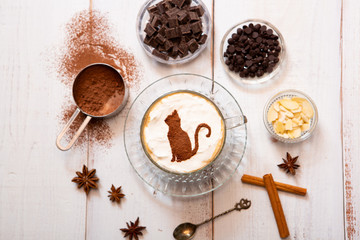 cat mark decorated on cup of hot chocolate
