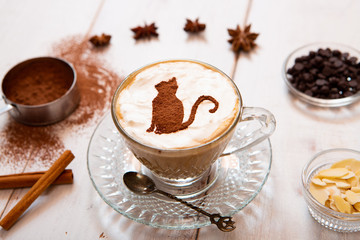 cat mark decorated on cup of hot chocolate