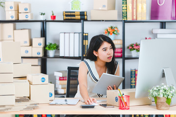 Young Asian business lady at office