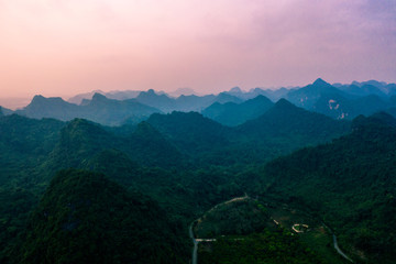 Aerial drone photo - Sunset over the mountains of Vietnam