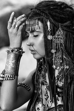 beautiful tribal woman dancer close up portrait at stone background