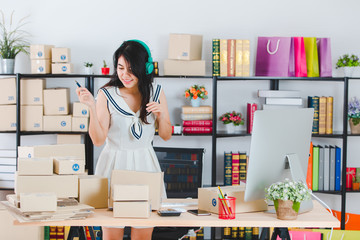 Young Asian business lady at office