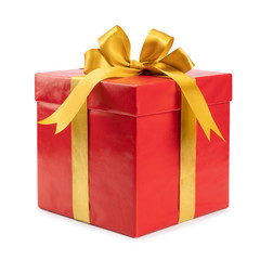 Red gift with golden bow on white background.