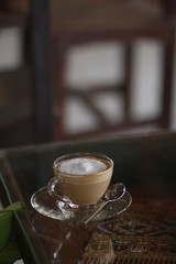 cup of coffee on wooden table