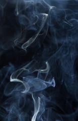 Abstract white smoke on black background