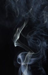 Abstract white smoke on black background