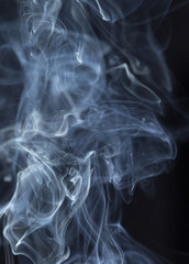 Abstract white smoke on black background