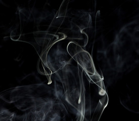 Abstract white smoke on black background