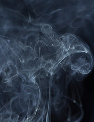 Abstract white smoke on black background