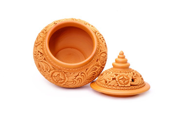 Casket : Thai traditional earthenware casket isolated on white background. Beautiful Flowers carved earthenware from Thailand. Handmade pottery caskets for keep scented flowers and perfumes.