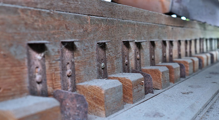 close up of old machinery for rice production