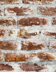 Brown color brick wall vertical texture background.