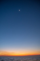 Sunset sky on the beach background.
