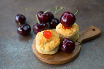 Homemade classic scone with fresh cherries
