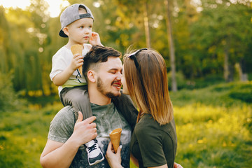 Fototapeta premium Cute family in a park