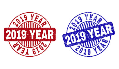 Grunge 2019 YEAR round stamp seals isolated on a white background. Round seals with grunge texture in red and blue colors. Vector rubber overlay of 2019 YEAR tag inside circle form with stripes.