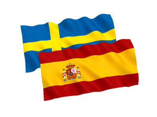 National fabric flags of Sweden and Spain isolated on white background. 3d rendering illustration. Proportion 1:2