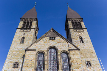 Fototapeta na wymiar Towers of the St. Clemens church in Rheda-Wiedenbruck, Germany