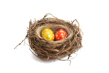 chocolate eggs in a nest isolated