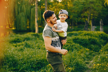Fototapeta premium Father with son in a park